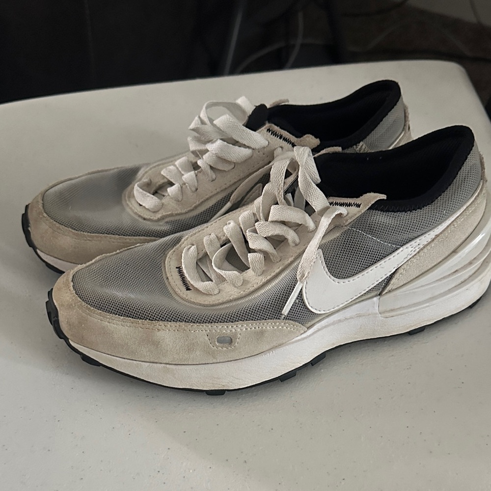 Nike Cream and Black Running Shoes